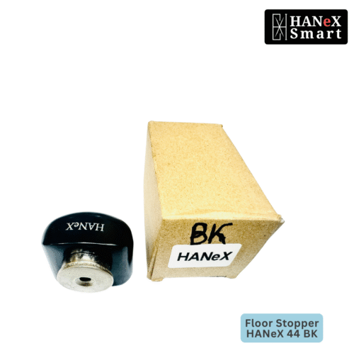 HANeX 44 BLACK Floor Stopper installed on floor protecting wall from door handle impact